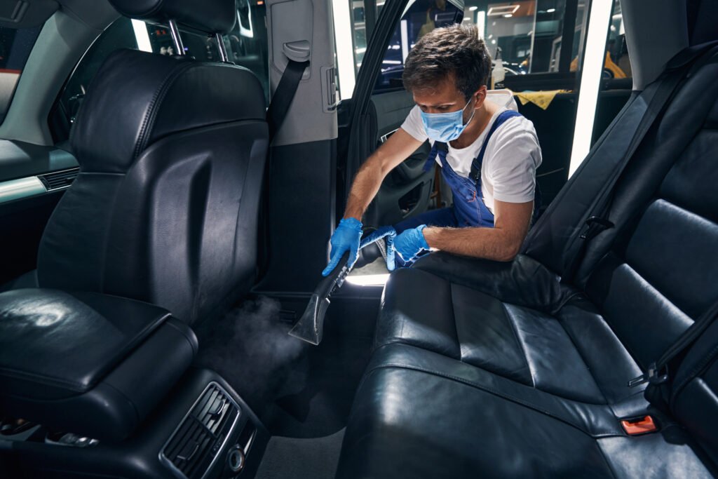 Male Steam Cleaning Under Back Seats Of Automobile 2022 01 19 00 11 18 Utc 1024x683 